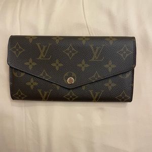 Brand new Louis Vuitton wallet, brown and red combination colors.